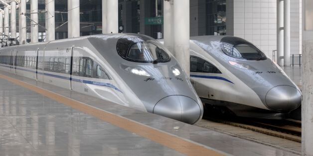 LUOYANG, CHINA - JULY 01: (CHINA OUT) A CRH high-speed train os shown at Longmen Railway Station on July 1, 2014 in Luoyang, China. China will have established a high-speed railway network covering almost all its cities with a population of more than 500,000 by 2015. According to the plan, China should basically complete the construction of a high-speed railway network with a total operating length of more than 40,000 kilometers by the end of 2015. (Photo by ChinaFotoPress/ChinaFotoPress via Getty Images)