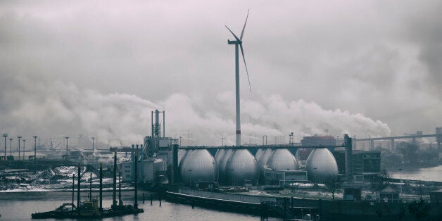 Germany, Hamburg, Industrial area and wind wheel