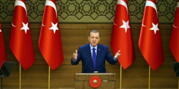 ANKARA, TURKEY - APRIL 6: Turkish President Recep Tayyip Erdogan addresses neighborhood leaders (mukhtars) during the mukhtars meeting at the Presidential Complex in Ankara, Turkey, on April 6, 2016. (Photo by Okan Ozer/Anadolu Agency/Getty Images)