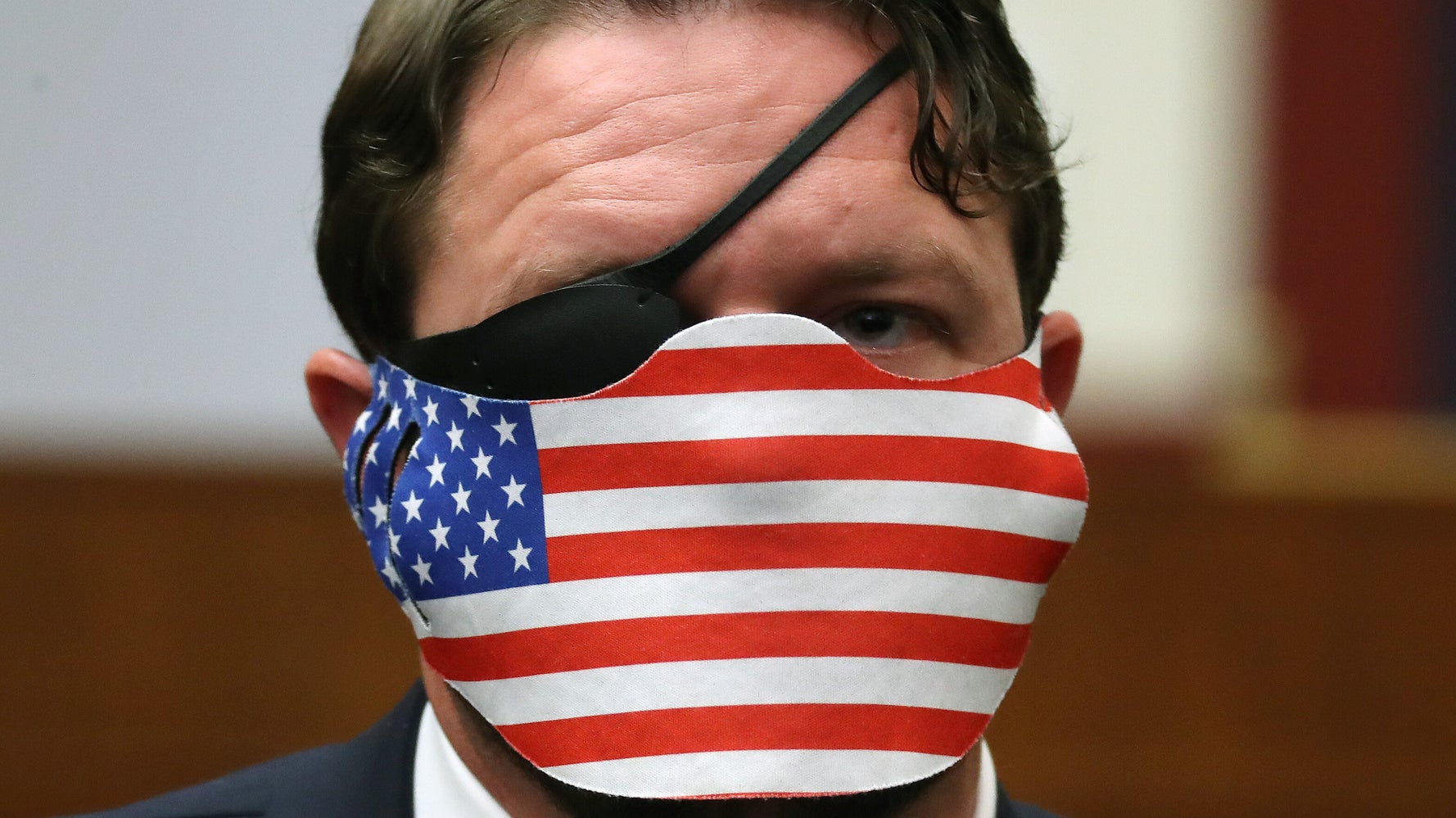 Rep. Dan Crenshaw Steps In It As He Demands Ouster Of Olympian Who Shunned U.S. Flag