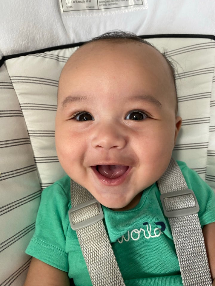 Zane loves to spend time with the family dogs, Rexy and Liv, and "laugh the day away in his bouncer," according to a profile on Gerber's website.