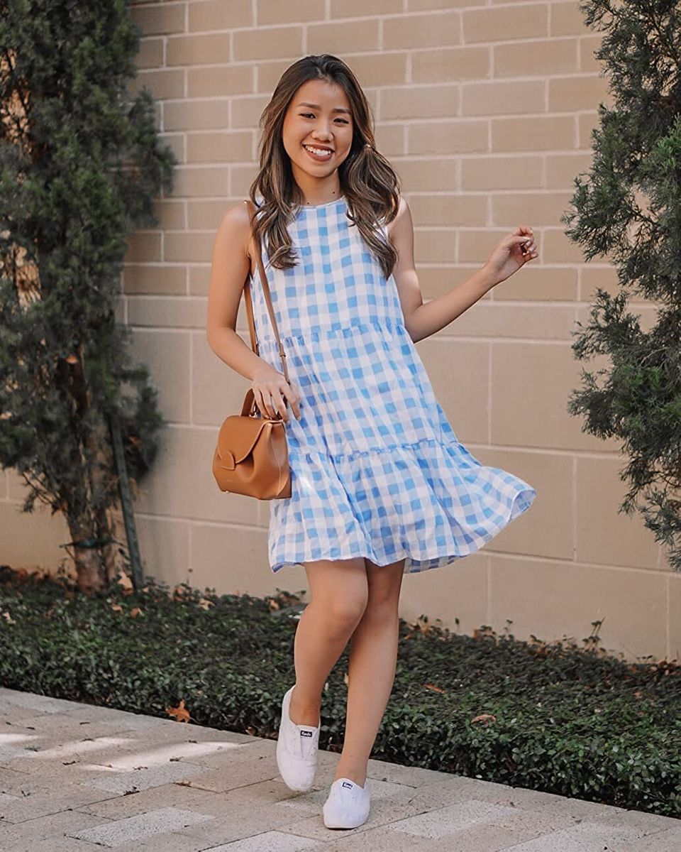 A tiered, sleeveless gingham frock
