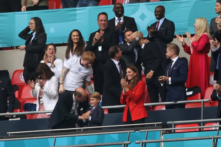 Ed Sheeran and David Beckham sit in the stands alongside the royals.&nbsp;