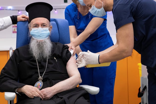 Metropolitan Hierotheos of Nafpaktos and Agios Vlasios receives the Pfizer-BioNTech coronavirus disease (COVID-19) vaccine at Evangelismos hospital, in Athens, Greece, December 27, 2020. REUTERS/Alkis Konstantinidis/Pool