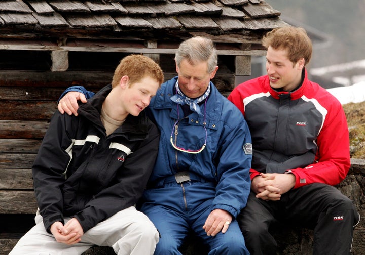 The boys with their father Prince Charles during a 2005 ski trip in Switzerland.