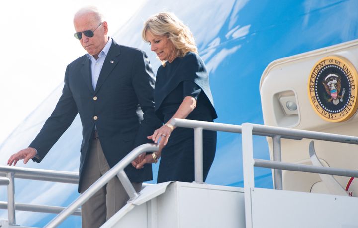 President Joe Biden and first lady Jill Biden disembark Air Force One at the Miami International Airport on Thursday as they travel to Surfside, Florida, to visit with families of the condo collapse victims.