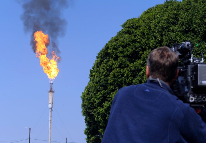 Flames leap from a burner unit after an explosion at the Exxon Mobil refinery in Torrance, California.