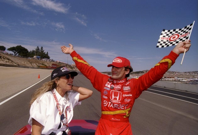 7 Sep 1997: Alex Zanardi of Italy celebrates with his wife Daniella during the Toyota Grand Prix of Monterey...