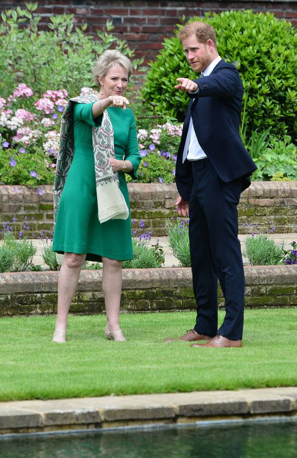 Harry greets Julia Samuel, founder of Child Bereavement UK and close friend of Princess Diana, at the unveiling.