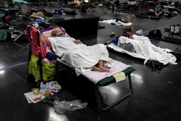 People sleep at a cooling shelter set up during an unprecedented heat wave in Portland, Oregon, on June 27.