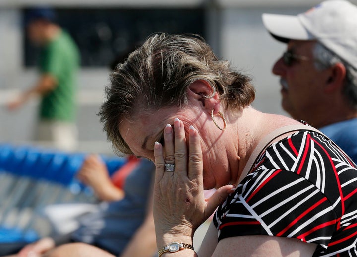 A Maryland woman wipes sweat off her face during a heat wave in Washington, D.C.