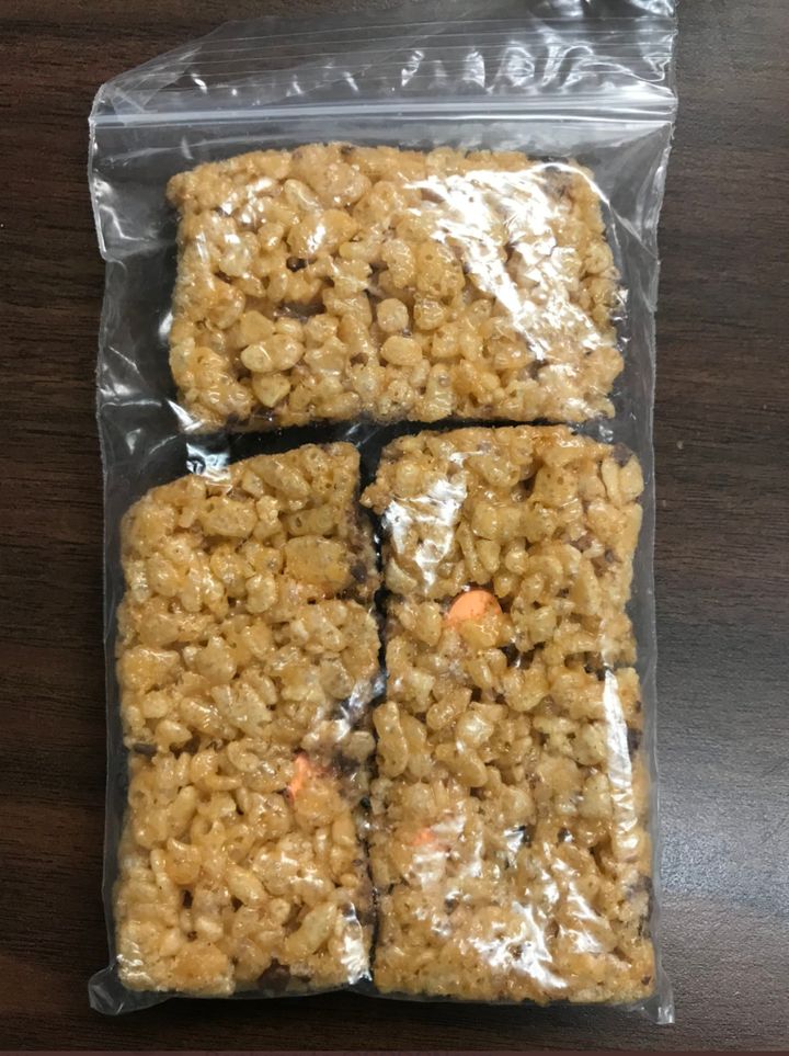A guard was fired and arrested after trying to smuggle prescription stimulant pills into a South Carolina women’s prison by hiding them in Rice Krispies treats, authorities said.