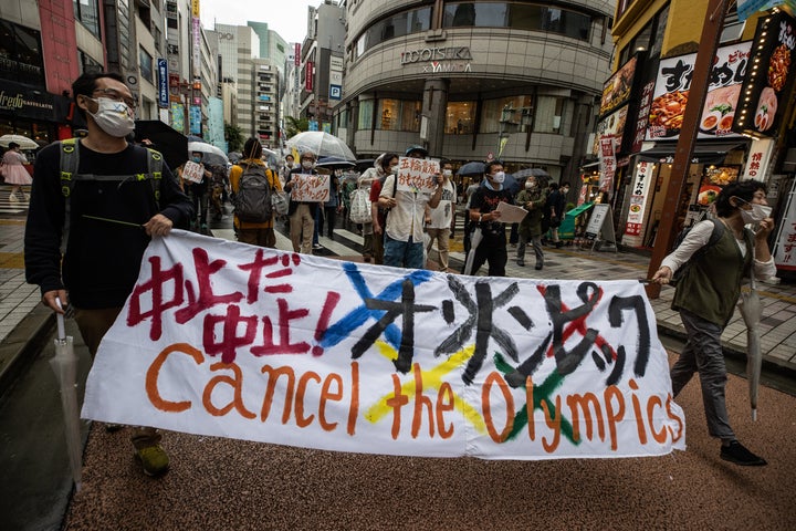 Protesters calling for the cancellation of the Tokyo Olympics marched through the city in mid-June. Japanese doctors have warned that holding the games amid the COVID-19 pandemic could lead to the creation of an "Olympic variant" of the virus that spreads across the world.