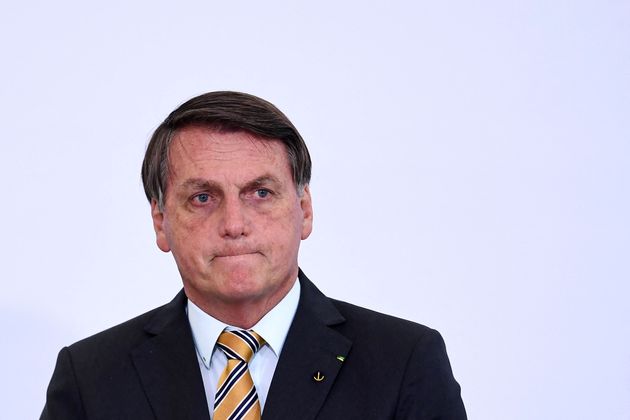 Le président Jair Bolsonaro est visé par une enquête concernant une éventuelle omission de dénonciation de corruption autour de l'achat par son gouvernement de vaccins contre le coronavirus (photo d'archive en date de novembre 2020).