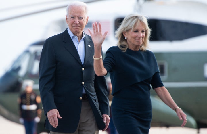 President Joe Biden and First Lady Jill Biden walk to board Air Force One on July 1.