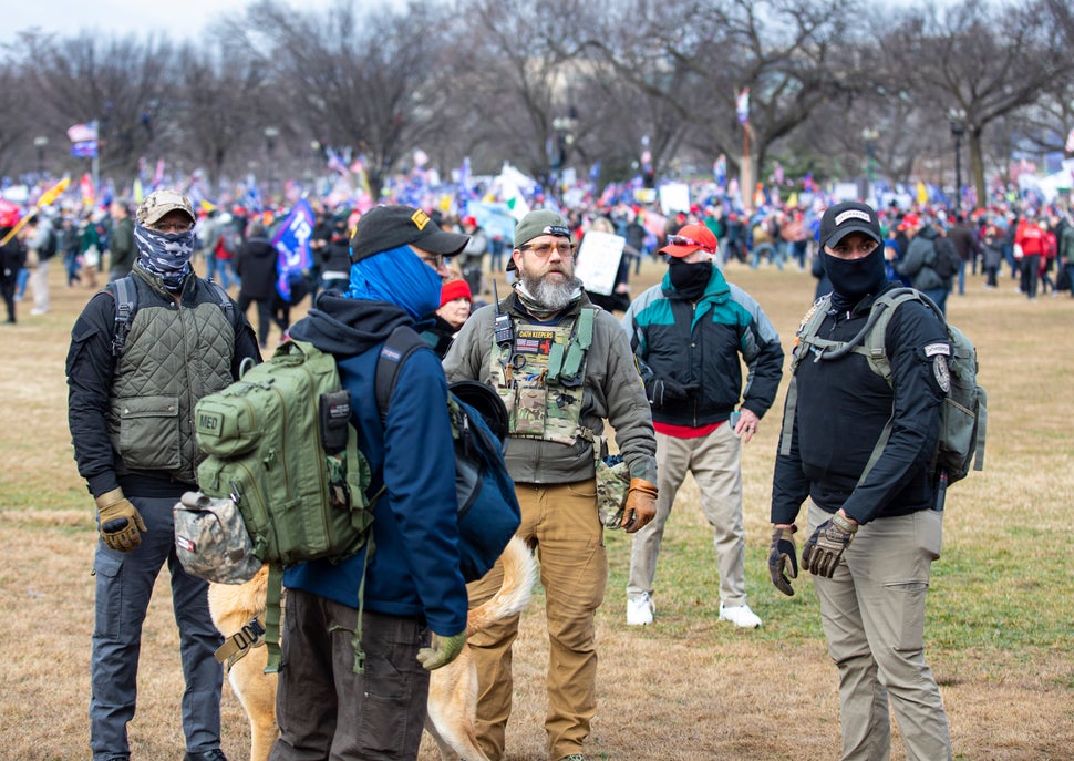 Members of the Oath Keepers wearing military tactical gear attend the "Stop the Steal" rally on Jan. 6 prior to the storming 