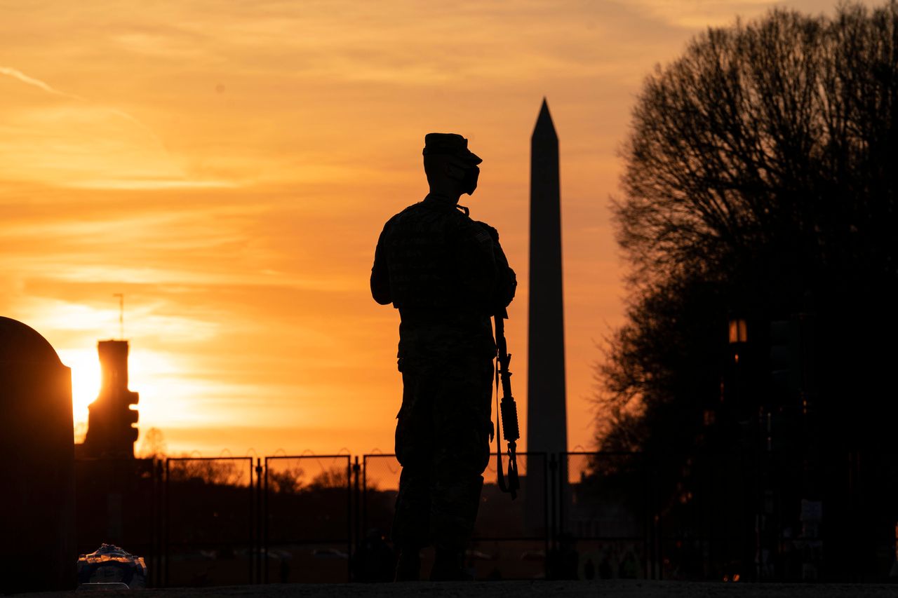 A member of the National Guard patrols outside the U.S. Capitol on March 8.