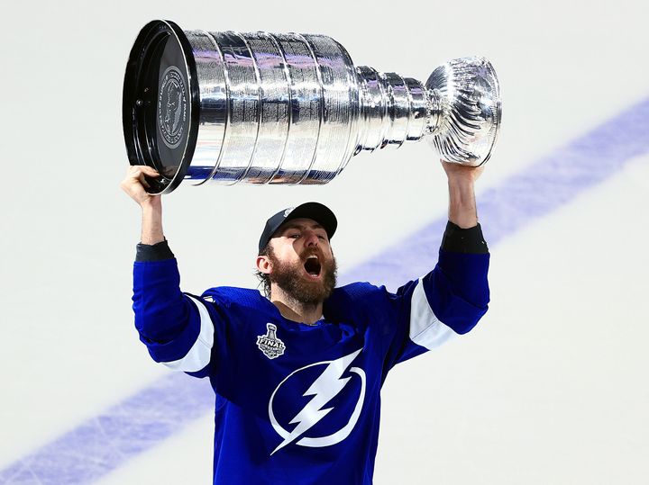 Barclay Goodrow of the Tampa Bay Lightning celebrates with the Stanley Cup after the 1-0 victory against the Montreal Canadiens in Game Five of the 2021 NHL Stanley Cup Final.