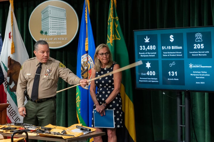 Los Angeles County Sheriff Alex Villanueva, left, and Supervisor Kathryn Larger, Los Angeles County Board of Supervisors, des