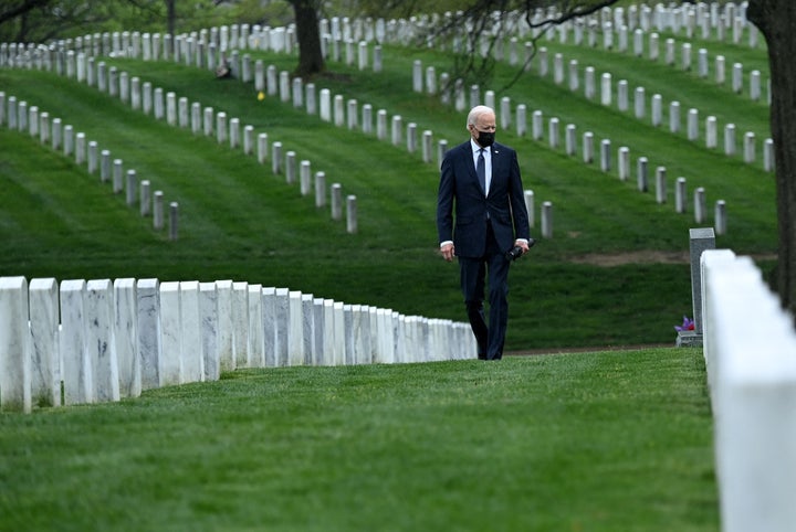 Biden walking through Arlington National Cemetery on April 14. He said at the time that it was "time to end" America's longest war.