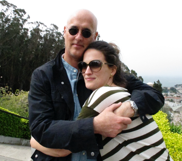 A picture of the author and her dad before the trip during which he died. She notes, 