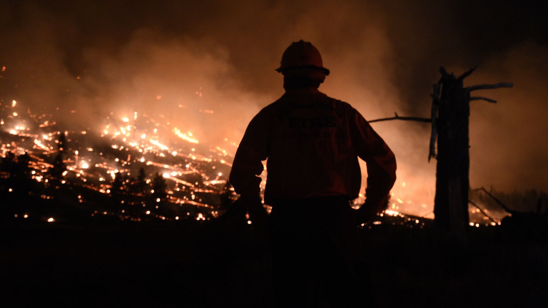 Fires Rage In Several States As Heat Wave Broils U.S. West