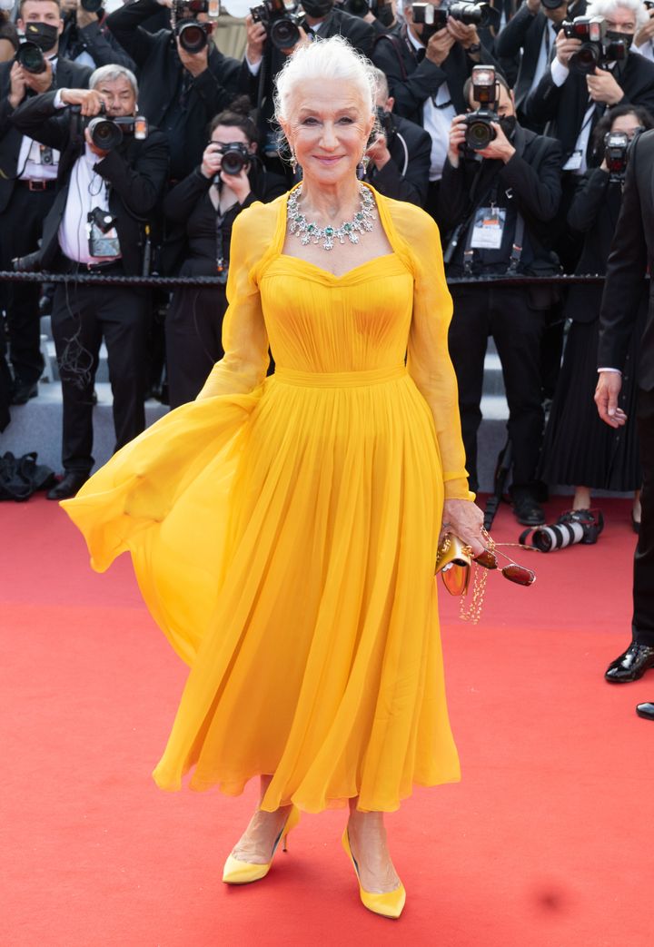 Helen Mirren attends the opening of the 74th Annual Cannes Film Festival in Dolce & Gabbana gown. 