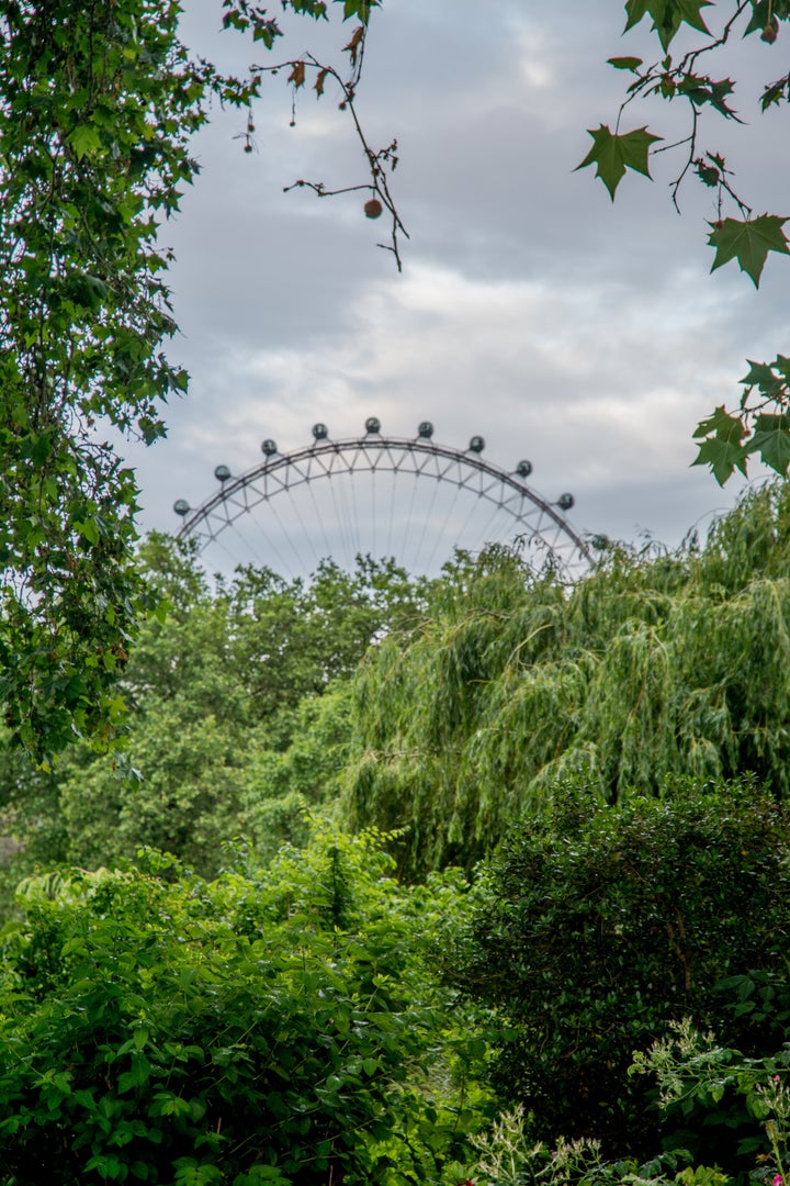 Ornamental gardens at the entrance of Buckingham Palace, London