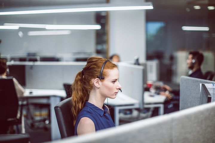 Customer Service Agents Working In Office