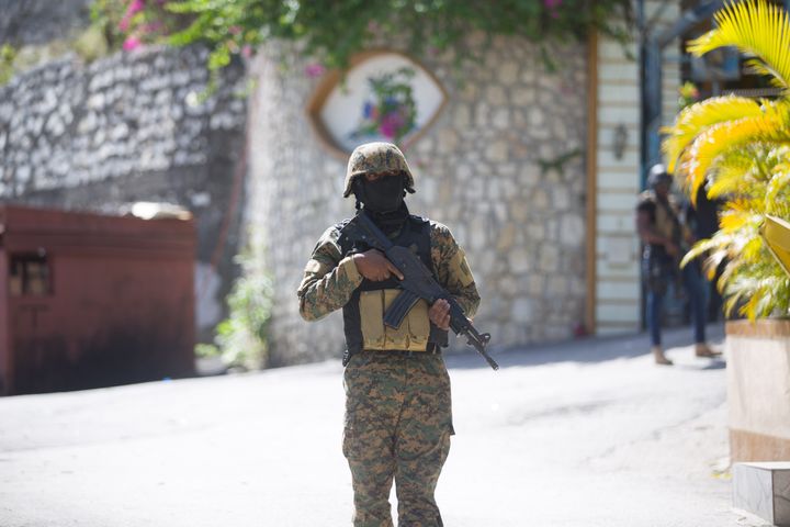 A soldier stands guard in front of Haitian President Jovenel Moise's home in Port-au-Prince, Haiti, on July 7, 2021. (Photo by Tcharly Coutin/Xinhua via Getty Images)