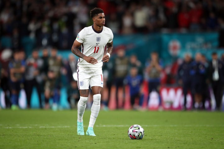 England's Marcus Rashford on the run up to his penalty kick Sunday during the shootout at the UEFA Euro 2020 Final at Wembley Stadium in London. 