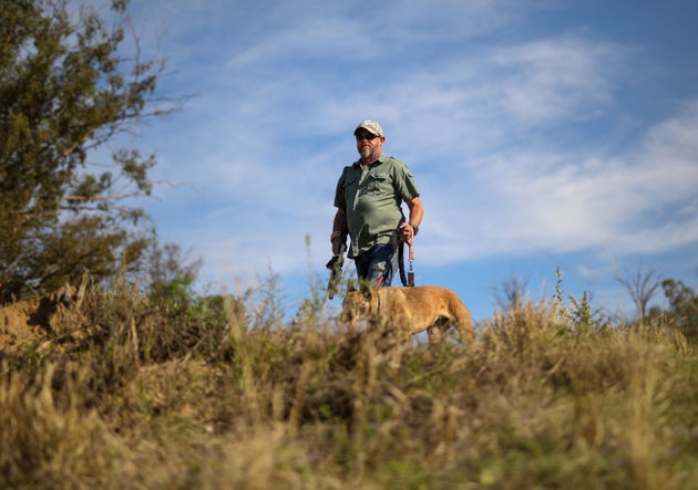 A game range with his dog doing anti poaching
