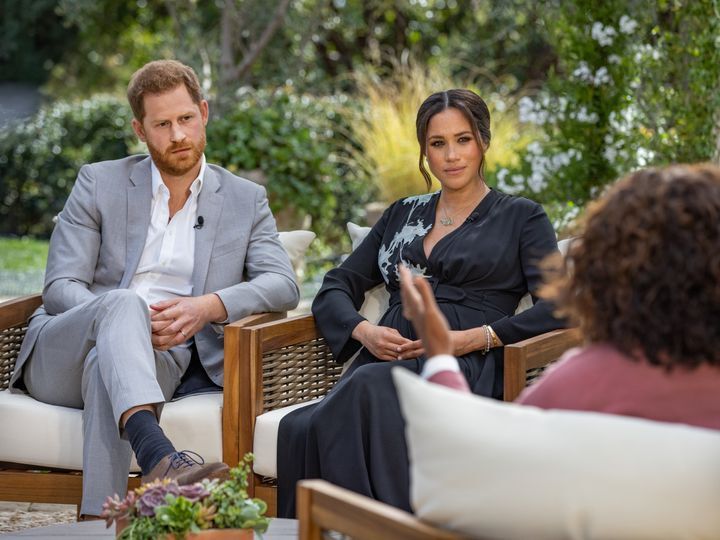 The Duke and Duchess of Sussex pictured with Oprah Winfrey during the interview.