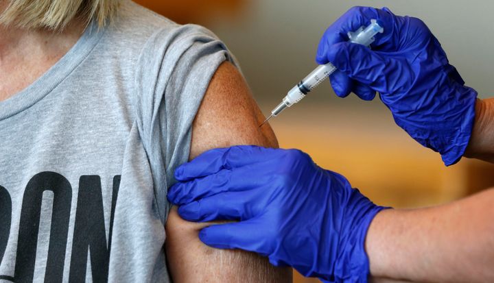 Karen Martin receives a COVID-19 vaccine at a vaccination clinic in Springfield, Mo., in this July 12, 2021, file photo. (Nathan Papes/The Springfield News-Leader via AP, File)