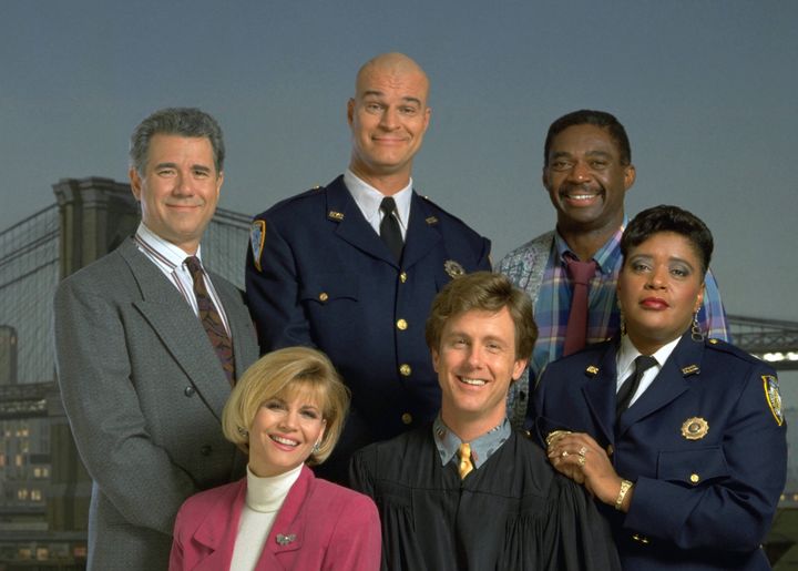 The cast of "Night Court": (l-r) John Larroquette as Dan Fielding, Markie Post as Christine Sullivan, Richard Moll as Nostradamus 'Bull' Shannon, Harry Anderson as Judge Harry T. Stone, Charles Robinson as Mac Robinson and Marsha Warfield as Rosalind 'Roz' Russell.