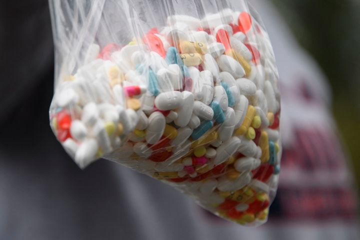 A bag of assorted pills and prescription drugs dropped off for disposal is displayed during the Drug Enforcement Administration (DEA) 20th National Prescription Drug Take Back Day at Watts Healthcare on April 24, 2021 in Los Angeles, California. 