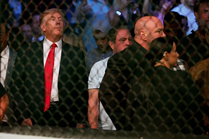 Former president Donald Trump looks on during UFC 264 in Las Vegas Saturday.
