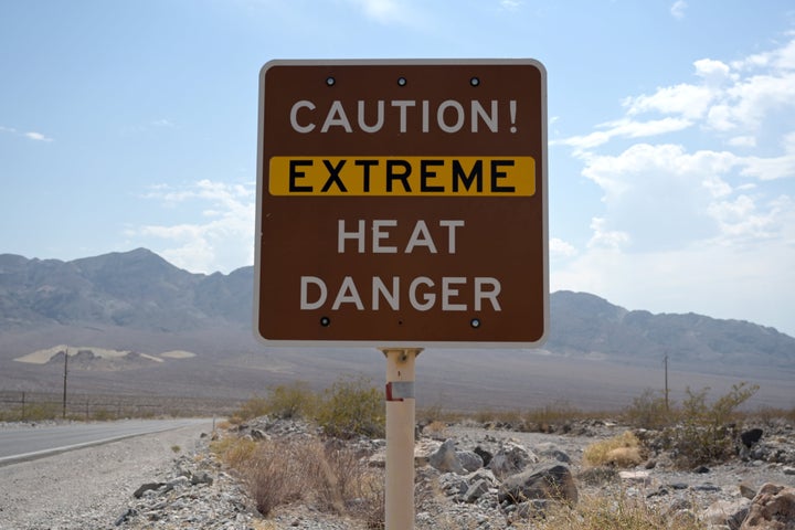 A sign warns of extreme heat in Death Valley, California, where temperatures hit a record 130 degrees Fahrenheit last week. 