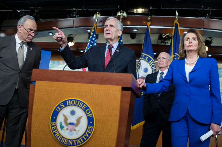 Rep. Lloyd Doggett (D-Texas), center, speaks at a press conference about prescription drug prices in 2018. Doggett believes t