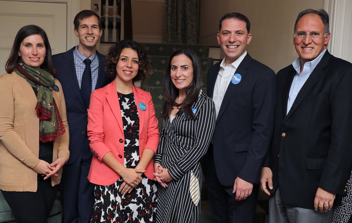 Auchincloss, second from left, and runner-up Jesse Mermell, far left, pose with fellow candidates in October 2019. The field would grow even larger, dividing the progressive vote.