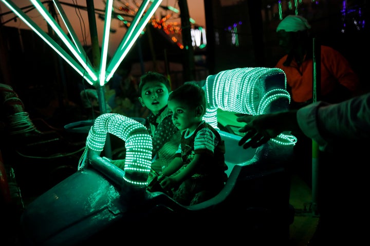 Photographer Danish Siddiqui capture children enjoying a ride at a fair in Mumbai, India, December 27, 2018. REUTERS/Danish Siddiqui