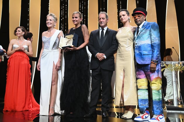 CANNES, FRANCE - JULY 17: (L to R) Maggie Gyllenhaal, Sharon Stone, Julia Ducournau, Vincent Lindon,...
