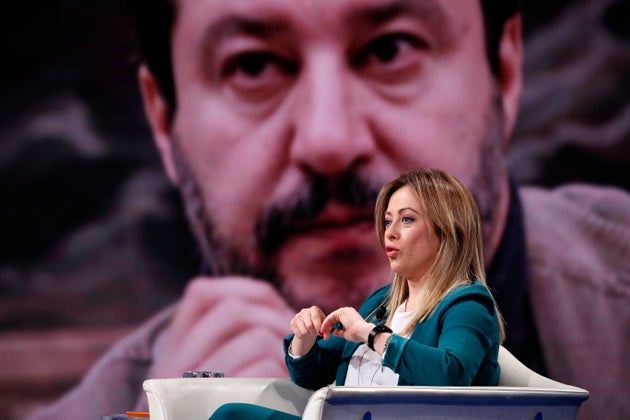 Italian politician Giorgia Meloni guest at Porta a Porta television broadcast, in the background Matteo...