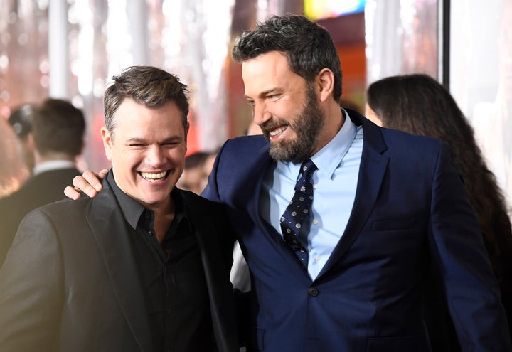 Matt Damon and Ben Affleck attend the premiere of Warner Bros. Pictures' "Live by Night" on Jan. 9, 2017, in Hollywood.