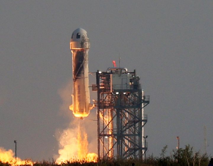 Blue Origin’s New Shepard lifts-off from the launch pad carrying Jeff Bezos along with his brother Mark Bezos, 18-year-old Oliver Daemen, and 82-year-old Wally Funk on July 20, 2021 in Van Horn, Texas. Mr. Bezos and the crew are riding in the first human spaceflight for the company. (Photo by Joe Raedle/Getty Images)