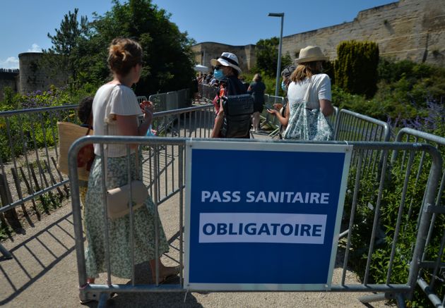 Sign 'Pass Sanitaire (Health Pass) - Compulsory' seen at the entrance to the Château de Caen.
On Wednesday, July 20, 2021, in Caen, Calvados, Normandy, France. (Photo by Artur Widak/NurPhoto via Getty Images)