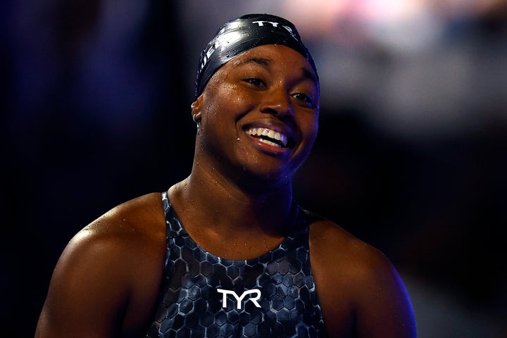 Simone Manuel reacts after competing in the women's 50-meter freestyle final during Day 8 of the 2021 U.S. Olympic Team Swimm