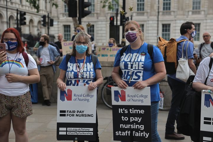 Nurses hold placards demanding for fair pay during the demonstration on the weekend of the 73rd anniversary of the NHS in the UK.