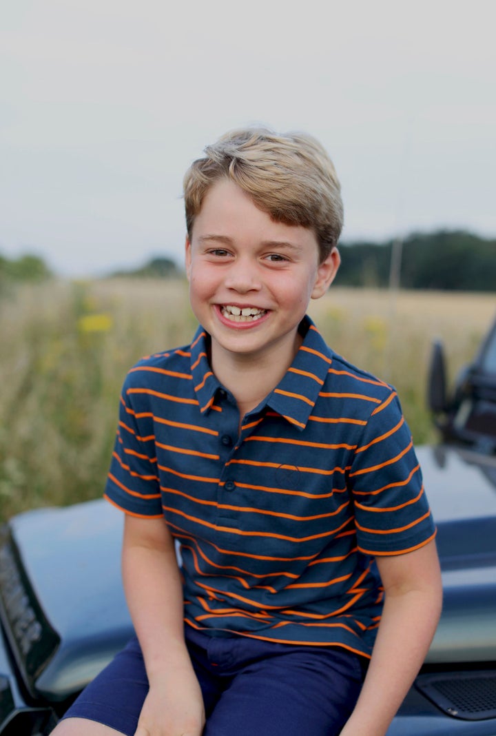 This July 2021 photo issued by Kensington Palace on July 21 shows Prince George in Norfolk, England, in a photo taken by his