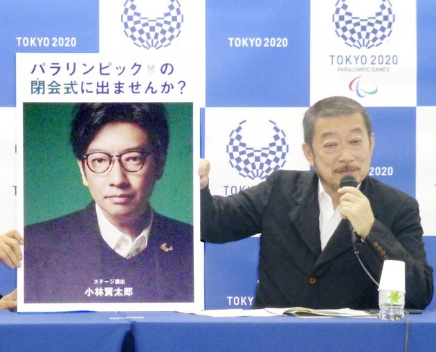 Hiroshi Sasaki, Tokyo 2020 Paralympic Games executive creative director, displays a portrait of Olympics opening ceremony show director Kentaro Kobayashi during a news conference in Tokyo, Japan, in this photo taken by Kyodo December 2019. Mandatory credit Kyodo via REUTERS ATTENTION EDITORS - THIS IMAGE WAS PROVIDED BY A THIRD PARTY. MANDATORY CREDIT. JAPAN OUT. NO COMMERCIAL OR EDITORIAL SALES IN JAPAN.